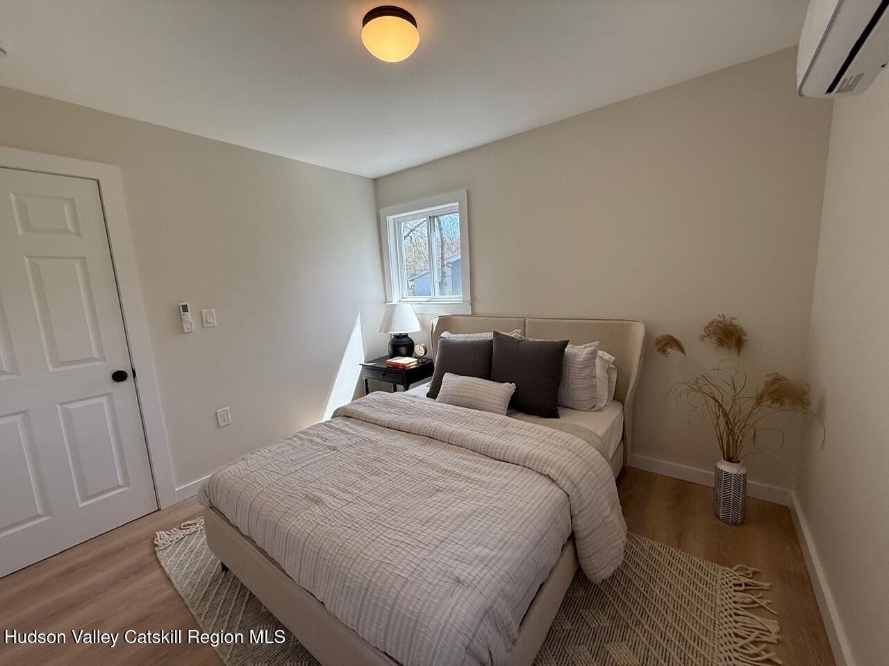 7 Park Circle High Falls, NY 12440 - Photo 17 of 31 a bedroom with a bed and window
