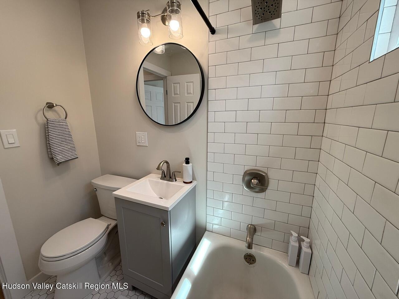 7 Park Circle High Falls, NY 12440 - Photo 20 of 31 a bathroom with a sink toilet and a mirror