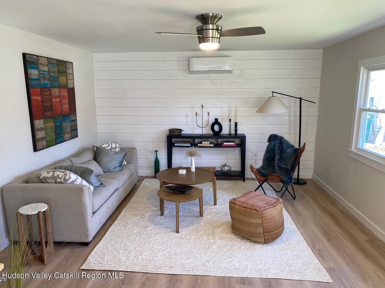 7 Park Circle High Falls, NY 12440 - Photo 23 of 31 a living room with furniture a rug and a window