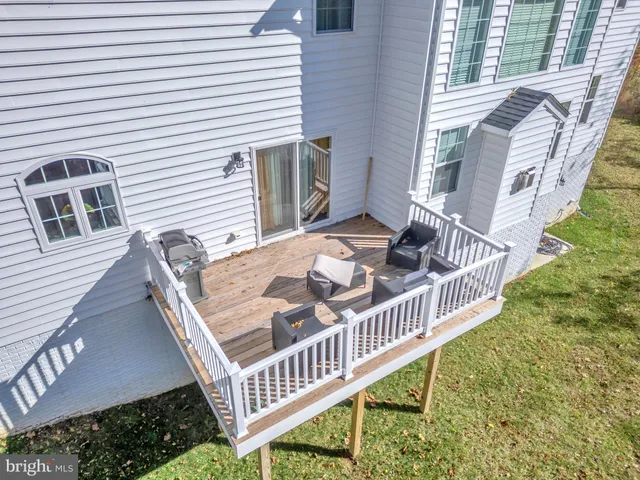 a swimming pool with some trees in the background