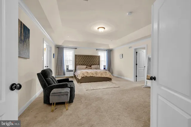 a bedroom with a bed and furniture