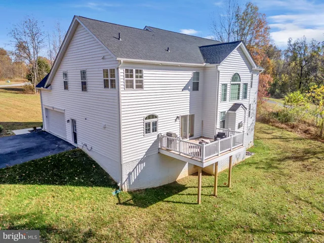 a living room with furniture fireplace and a flat screen tv