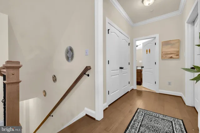 a view of a porch with wooden floor and stairs