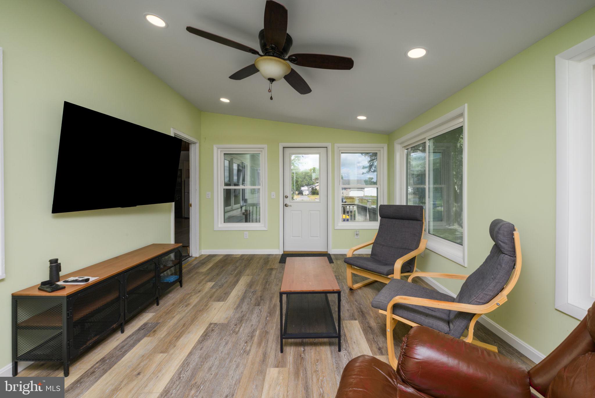 32517 Molly Field Road Dagsboro, DE 19939 - Photo 11 of 25 Bright and airy sunroom retreat.