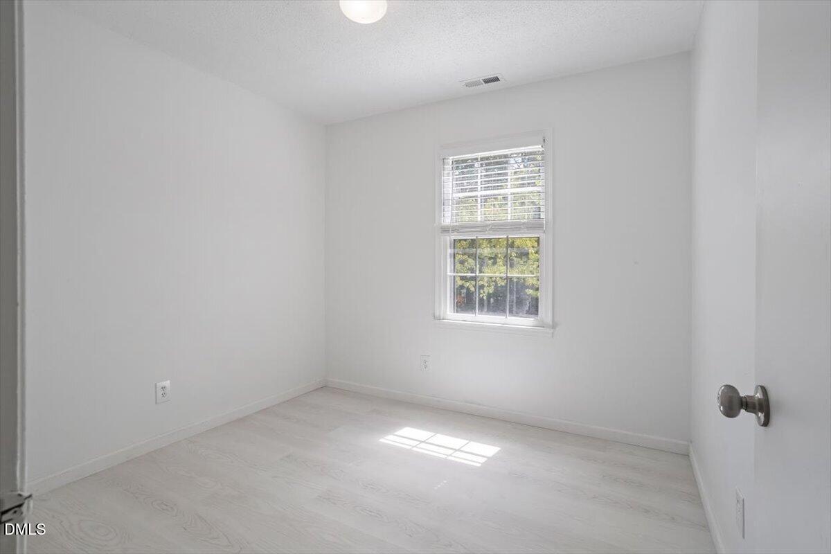 7412 Barberry Court Raleigh, NC 27615 - Photo 18 of 39 Bedroom 2