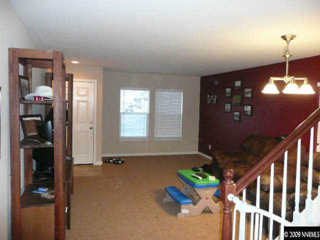 9010 Yeager Street Reno, NV 89506 - Photo 3 of 9 a view of an entryway door with a livingroom