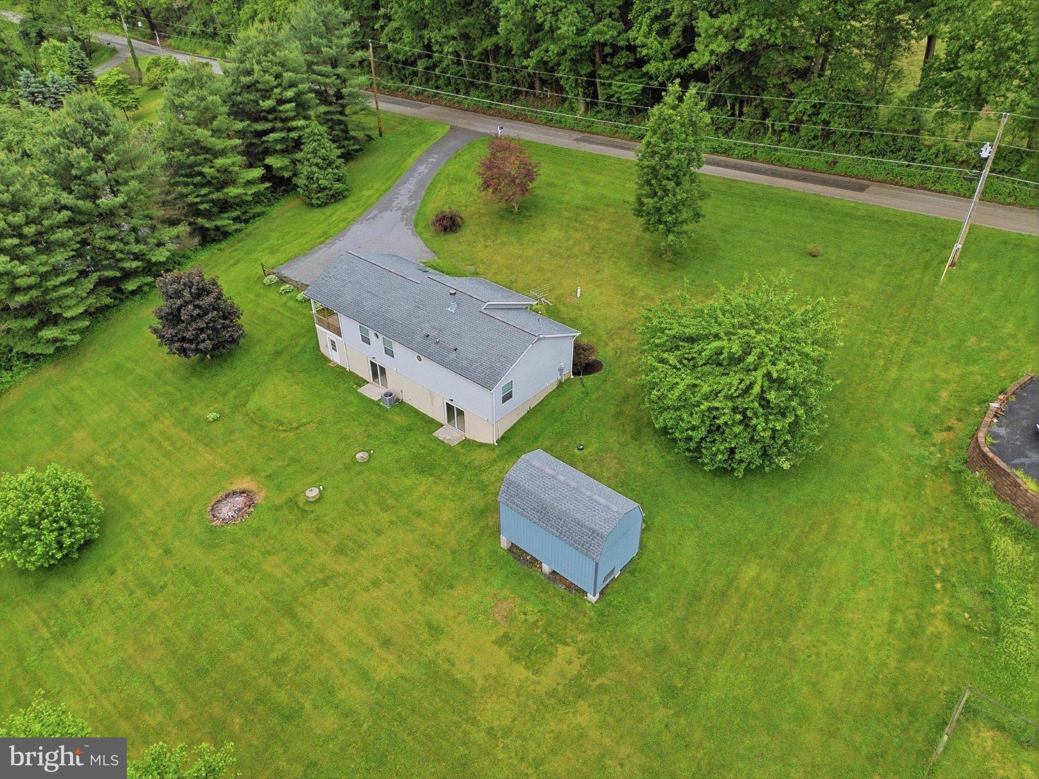 491 Garvine Mill Road Fawn Grove, PA 17321 - Photo 44 of 47 a garden view with a sitting space