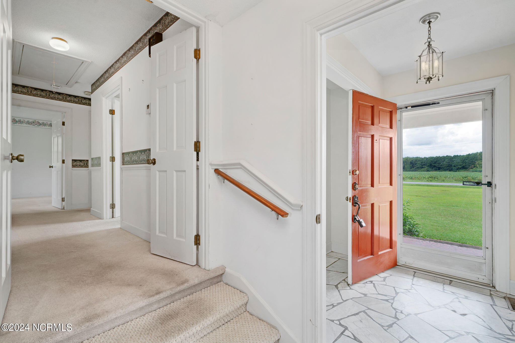 1279 Bay Road Teachey, NC 28464 - Photo 4 of 26 Foyer features slab flooring and a coat closet