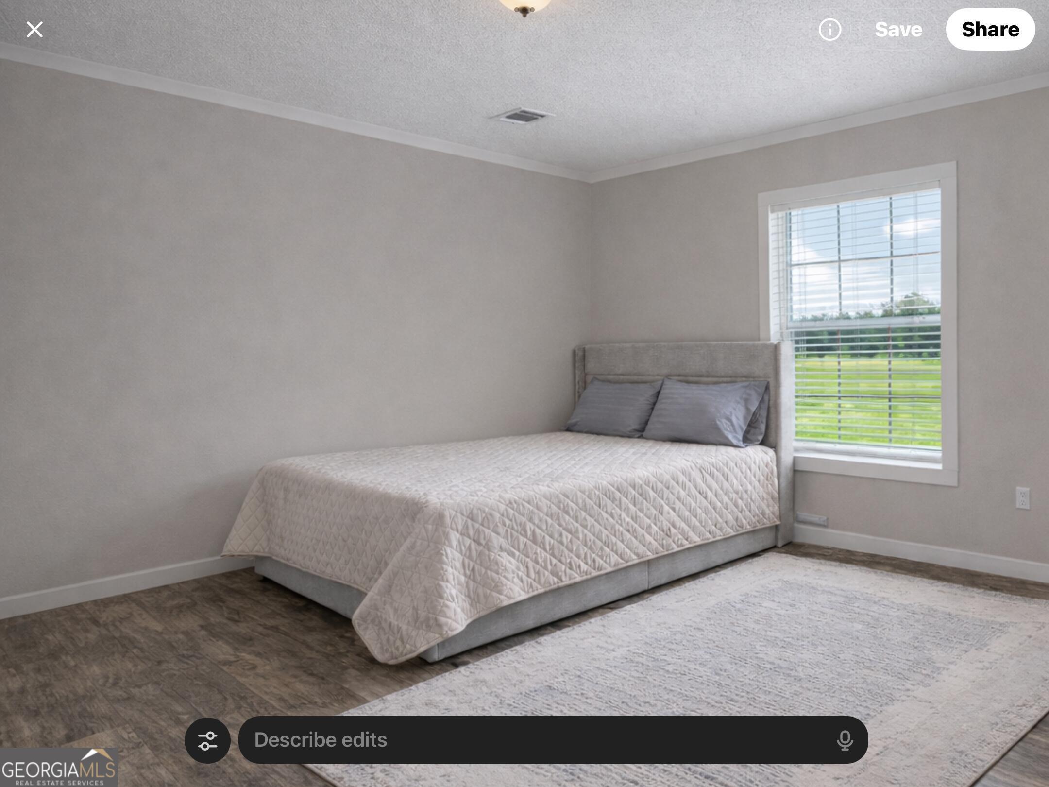 1900 Highway 212 Monticello, GA 31064 - Photo 11 of 20 a bedroom with a bed and a window