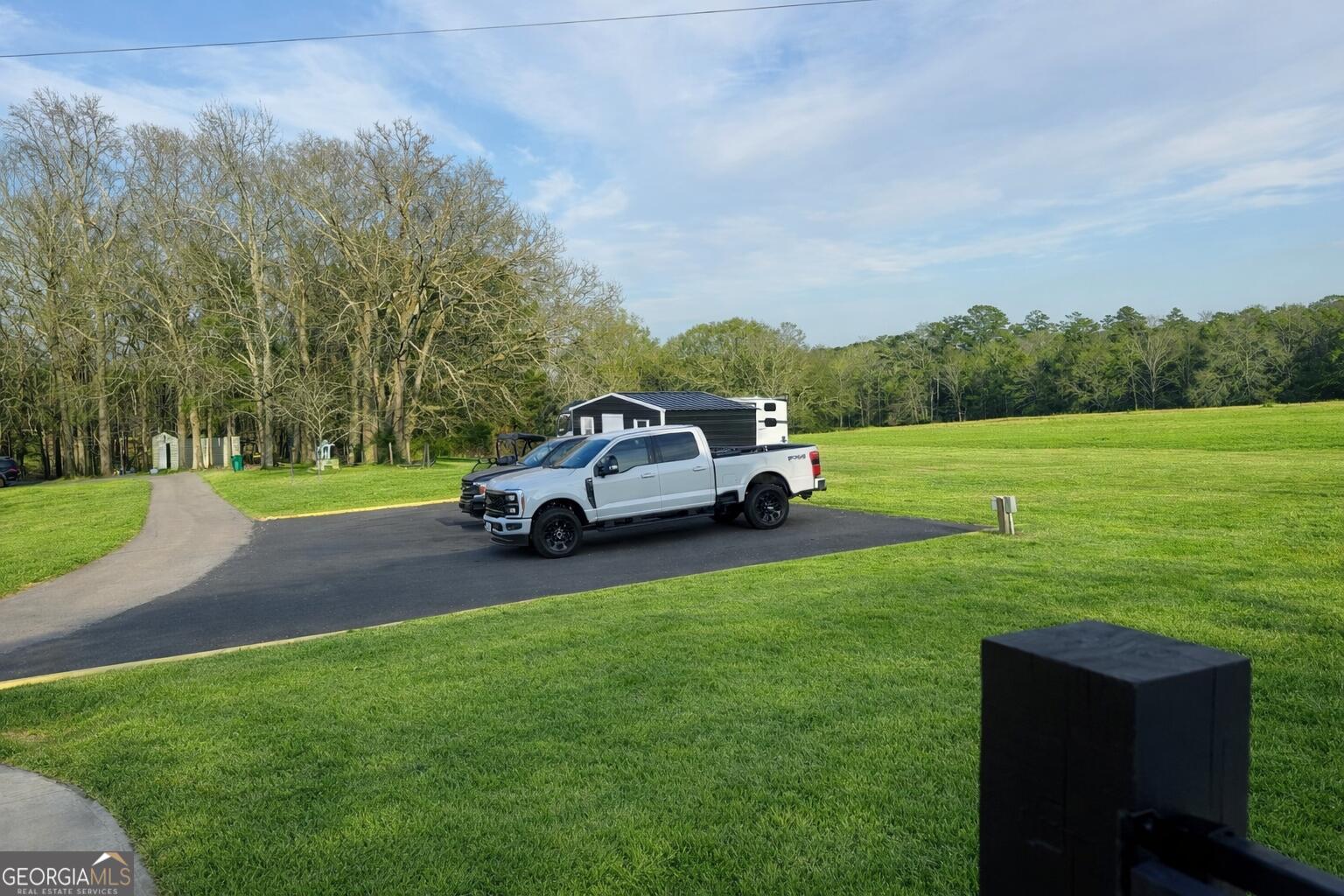 1900 Highway 212 Monticello, GA 31064 - Photo 13 of 20 a house view with a garden space