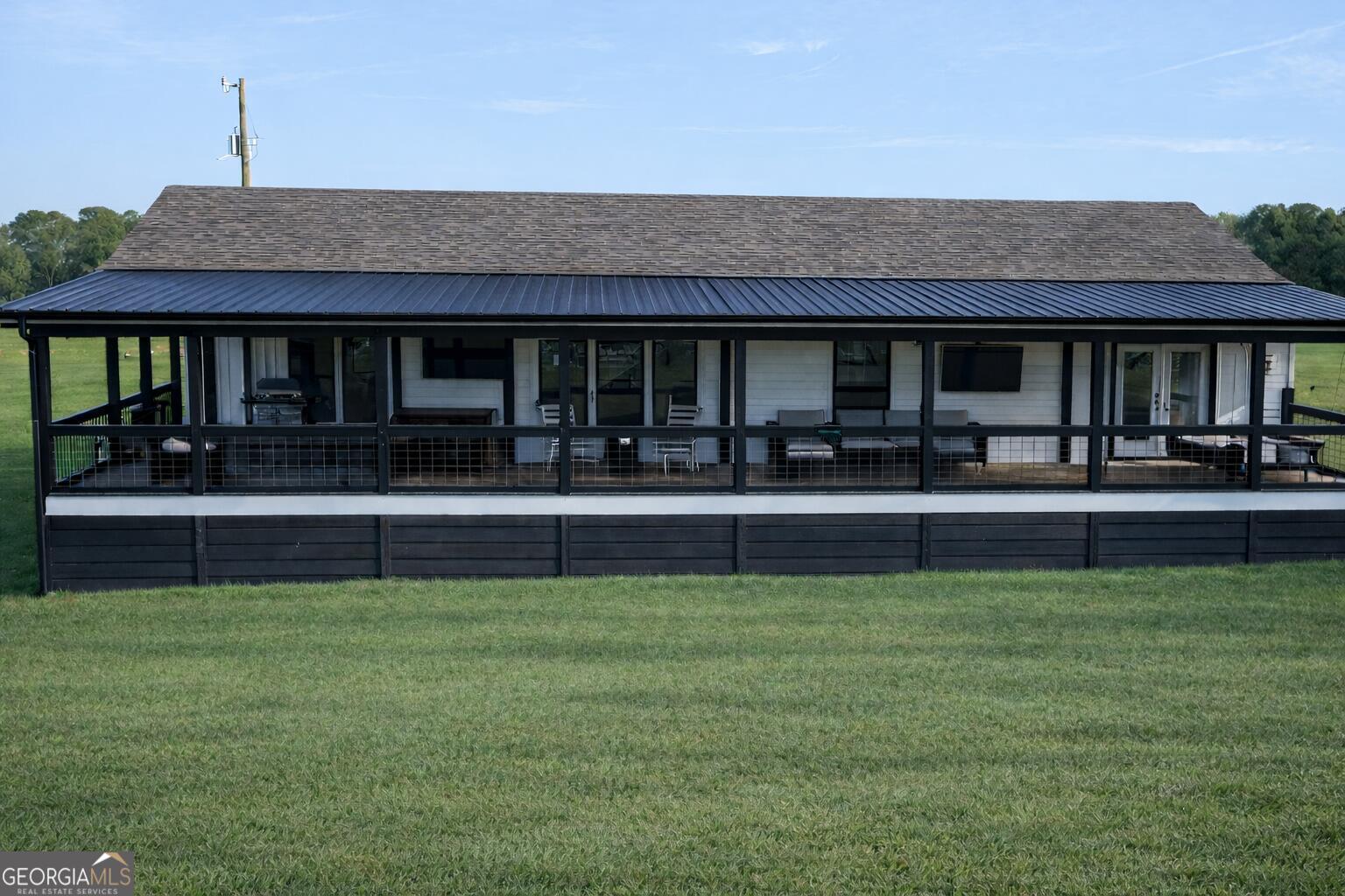 1900 Highway 212 Monticello, GA 31064 - Photo 14 of 20 a front view of a house with a yard