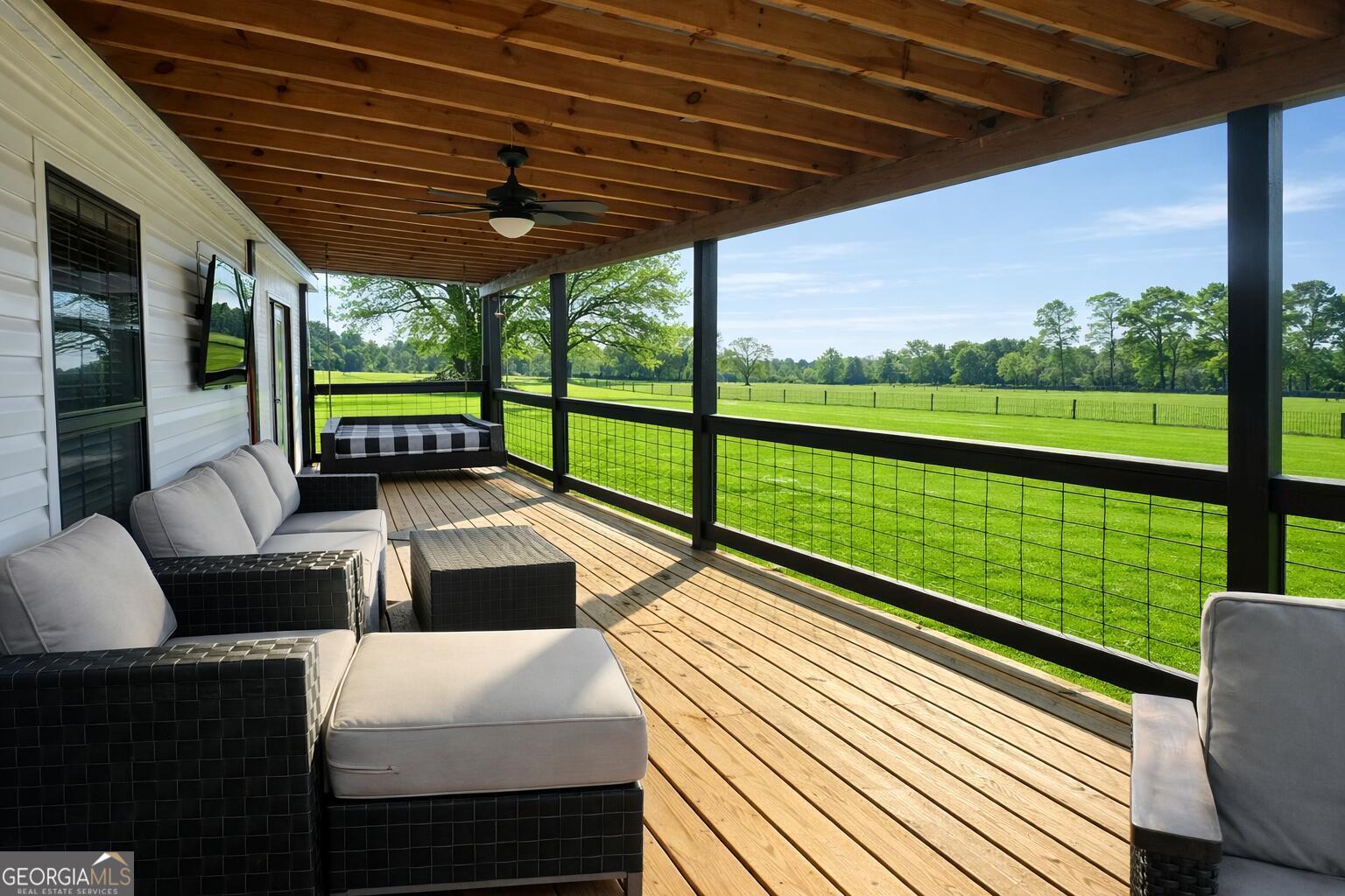 1900 Highway 212 Monticello, GA 31064 - Photo 17 of 20 a view of sitting area with furniture and wooden floor