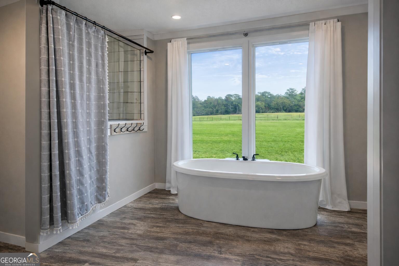 1900 Highway 212 Monticello, GA 31064 - Photo 5 of 20 a view of bathroom with bathtub and shower