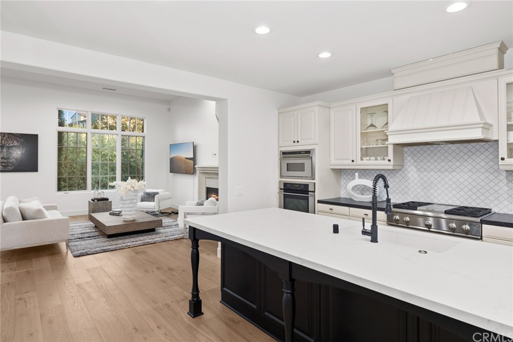 7 Hidden Pass Newport Coast, CA 92657 - Photo 19 of 30 a living room with furniture and a large window