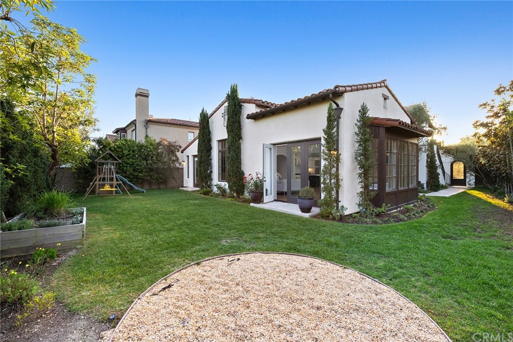 7 Hidden Pass Newport Coast, CA 92657 - Photo 22 of 30 a view of a house with a yard