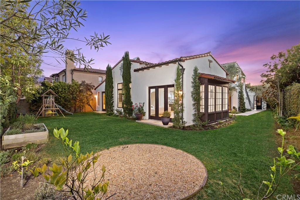 7 Hidden Pass Newport Coast, CA 92657 - Photo 26 of 30 a front view of a house with a yard