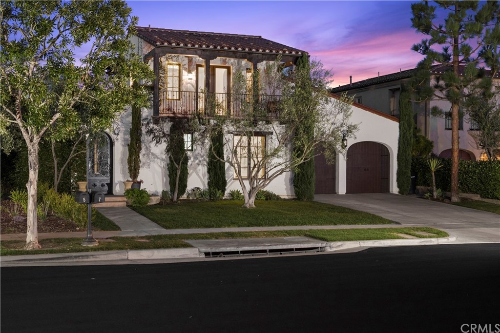 7 Hidden Pass Newport Coast, CA 92657 - Photo 3 of 30 a front view of a house with garden
