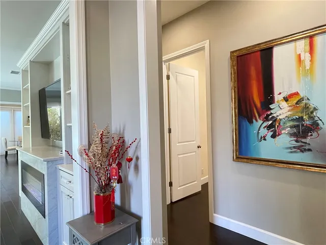 a bedroom with a bed and cabinets