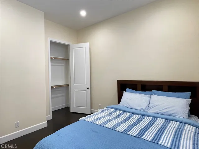 a bathroom with a toilet sink and shower