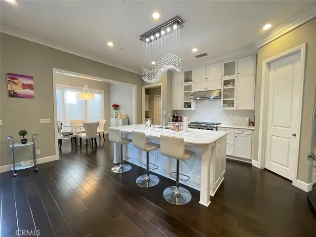 a kitchen with counter top space and appliances