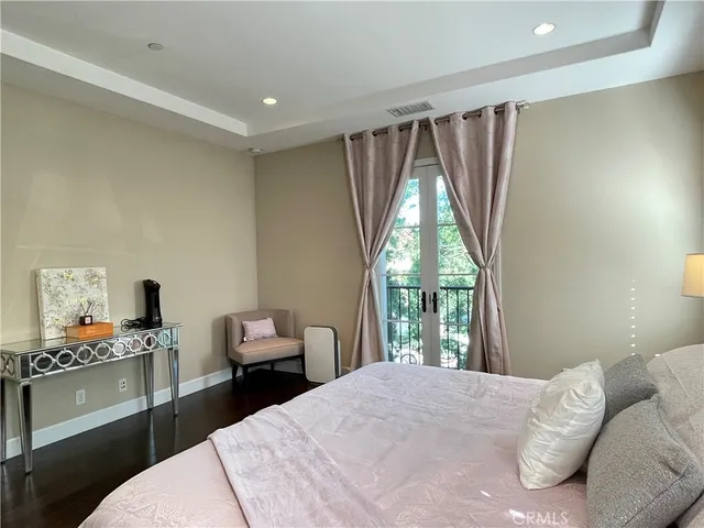 a bathroom with double sink and a mirror