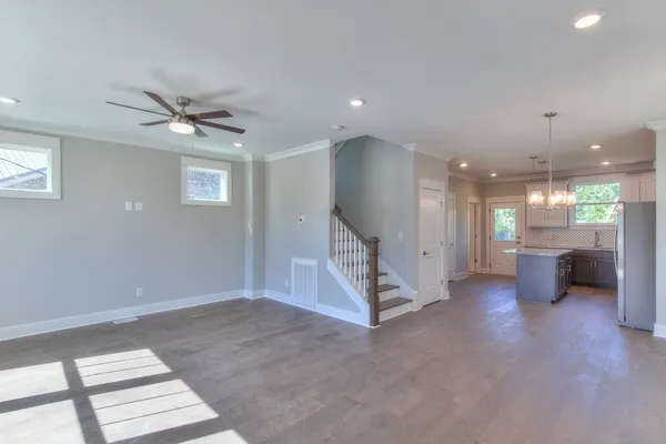 a view of a livingroom with a staircase