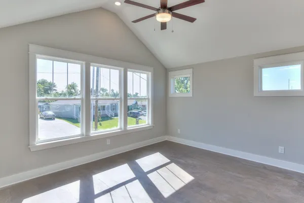 a view of an empty room with a window