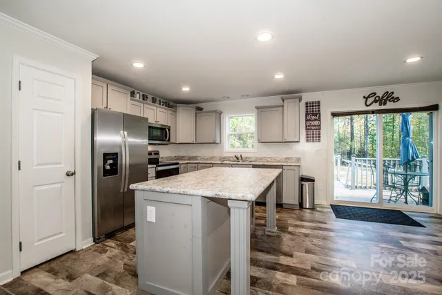 a view of a storage & utility room with a washer dryer