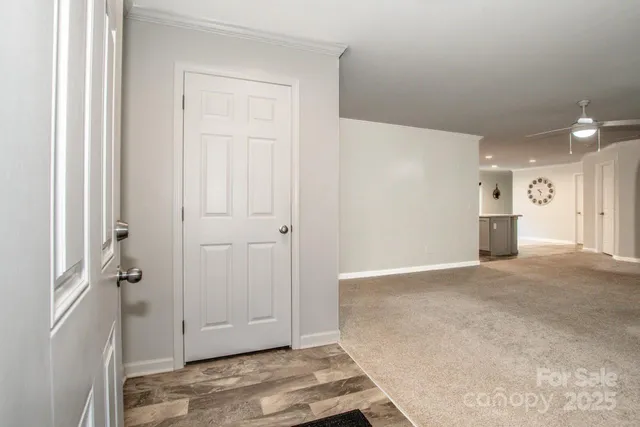 a bedroom with furniture and window