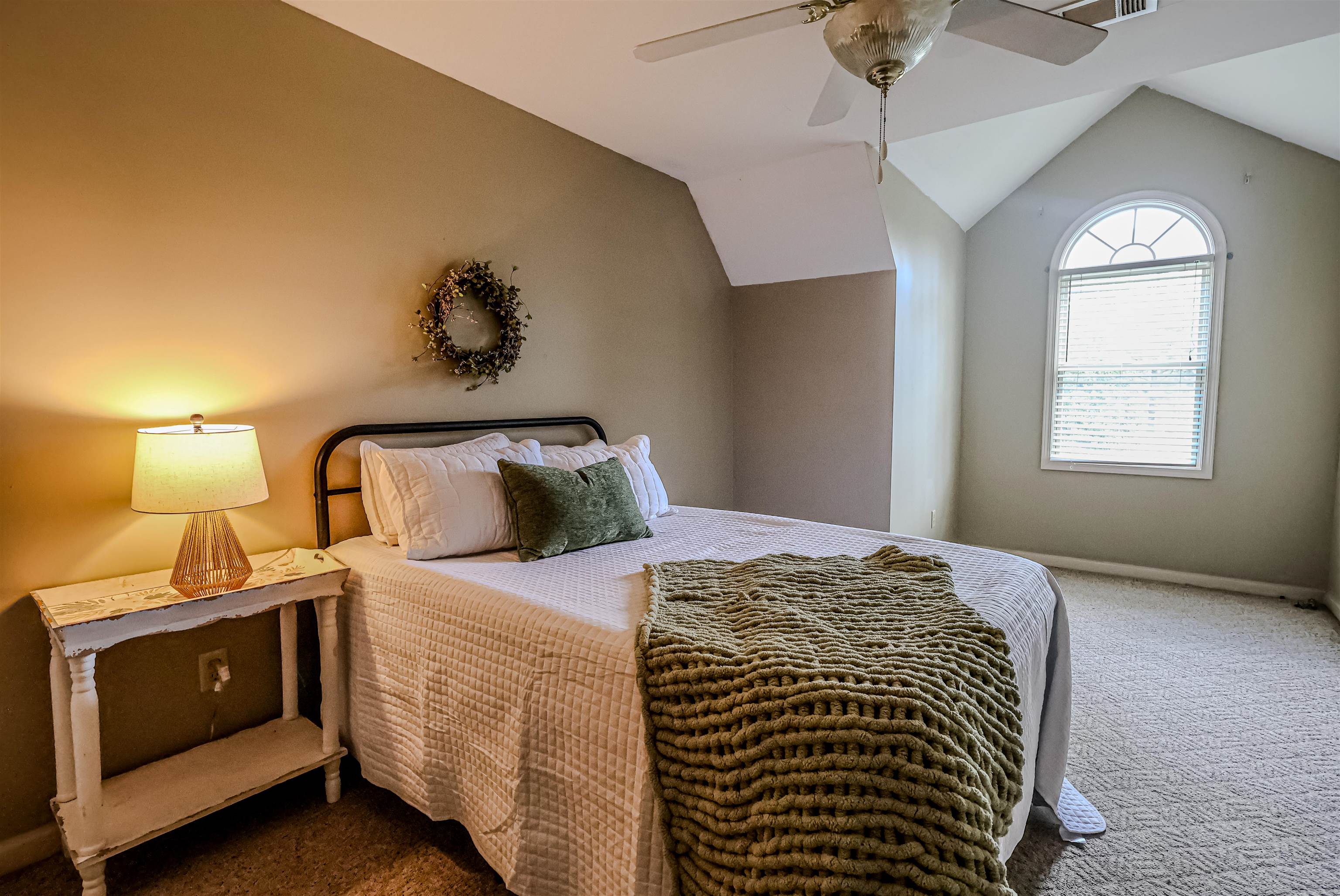 121 Reed Circle Drummonds, TN 38023 - Photo 19 of 38 Carpeted bedroom with baseboards, vaulted ceiling, and ceiling fan