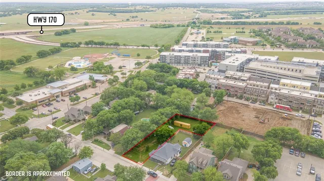 an aerial view of residential building and lake view