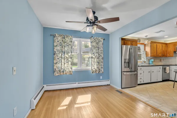 a view of a kitchen with a stove cabinets and a kitchen