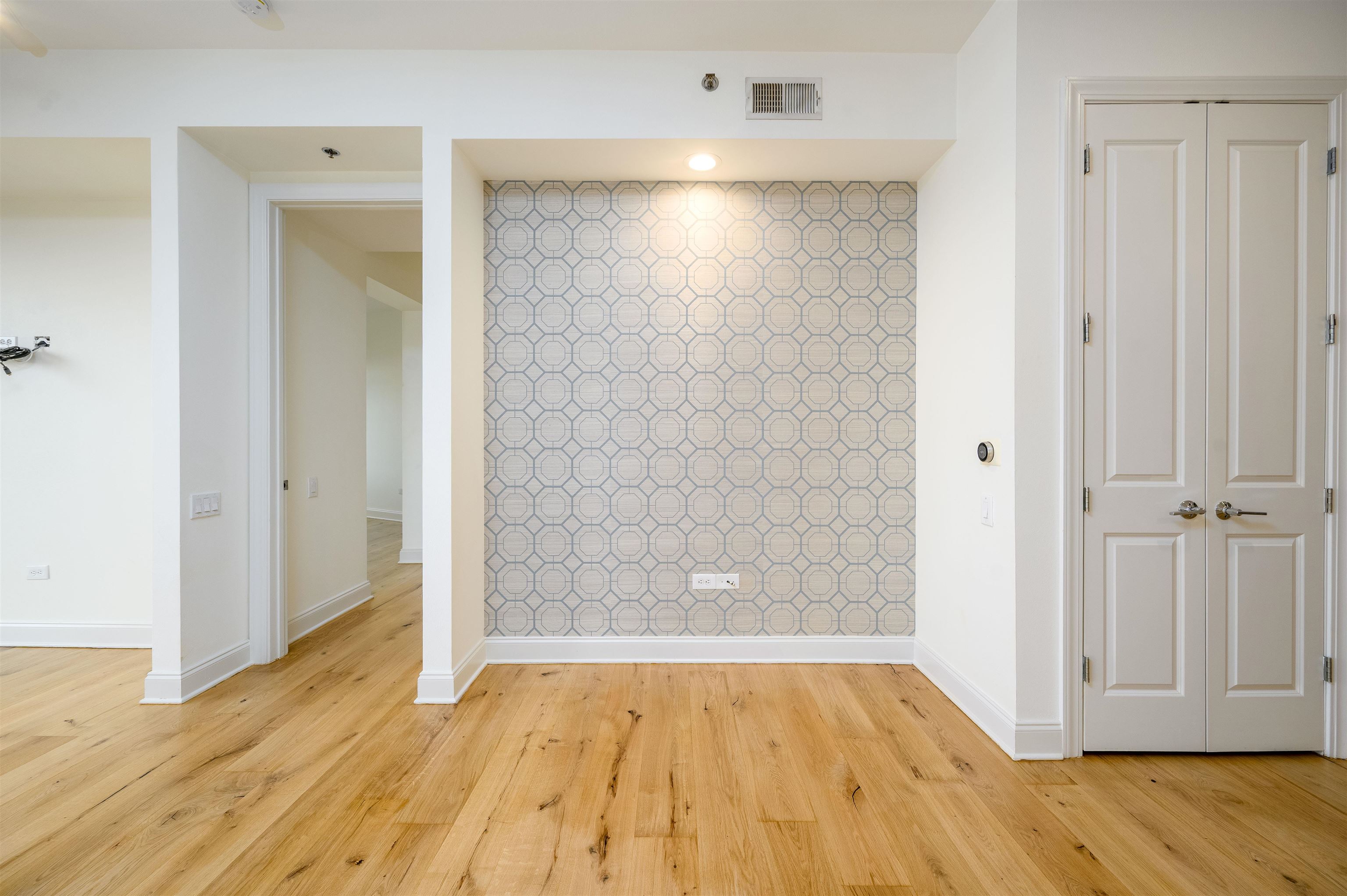 717 Riverside Drive, Unit 1506 Memphis, TN 38103 - Photo 19 of 38 wooden floor in an empty room