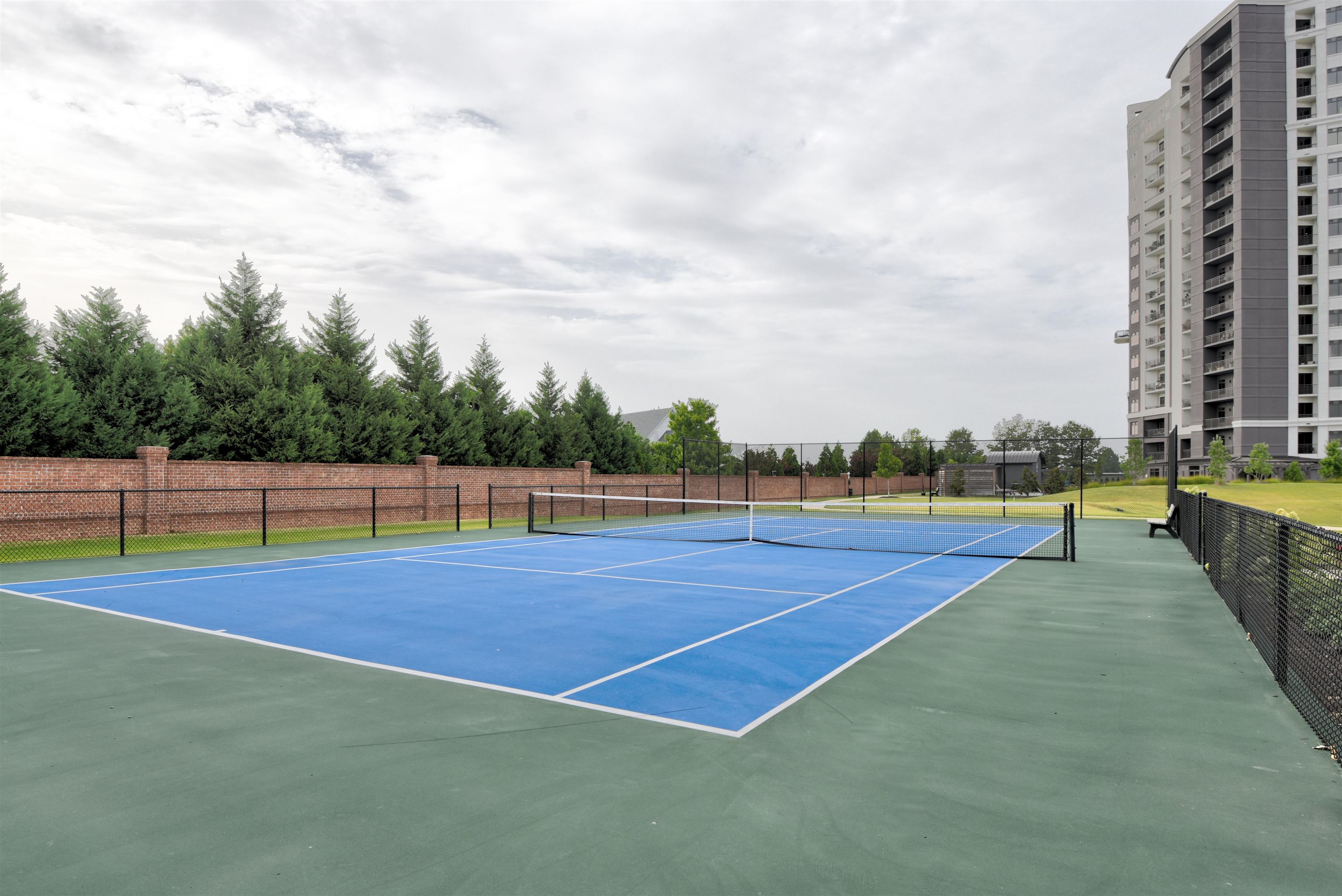 717 Riverside Drive, Unit 1506 Memphis, TN 38103 - Photo 34 of 38 a view of an outdoor space and basketball court