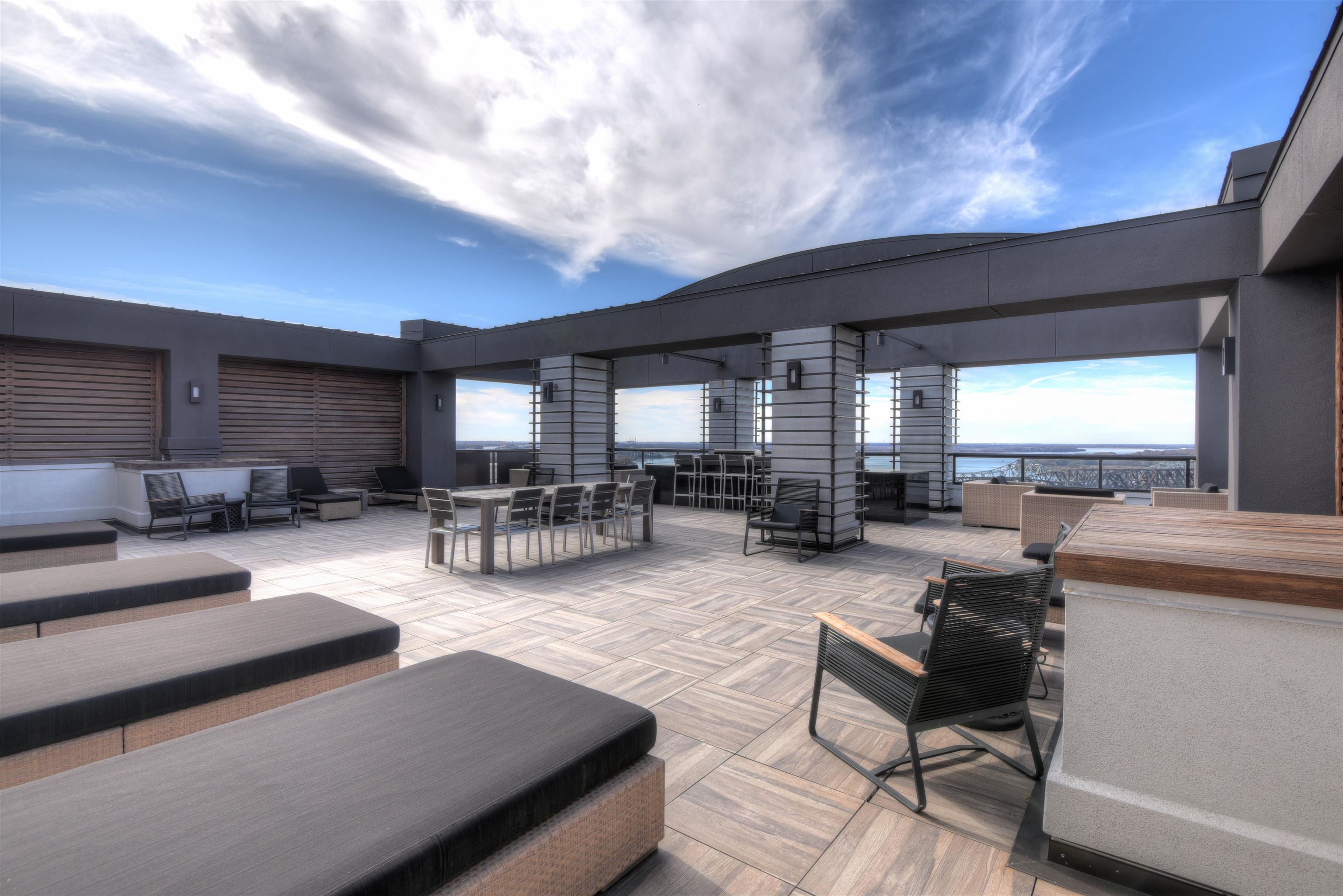 717 Riverside Drive, Unit 1506 Memphis, TN 38103 - Photo 38 of 38 a living room with furniture and a table