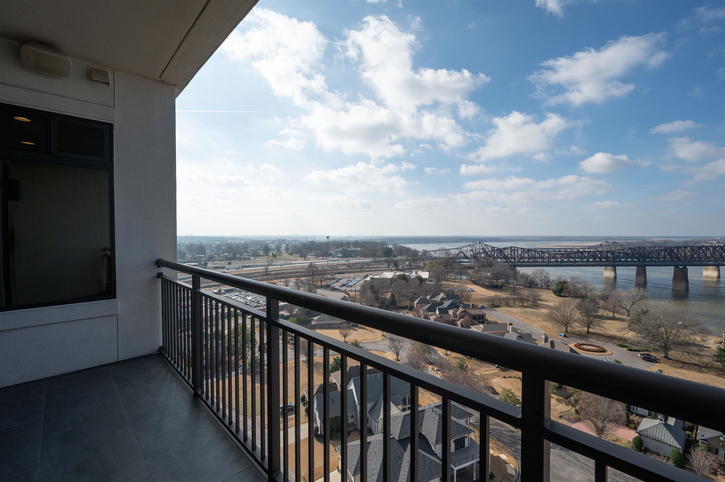 717 Riverside Drive, Unit 1506 Memphis, TN 38103 - Photo 5 of 38 a city view from a balcony