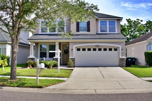 a house view with sitting space and garden space