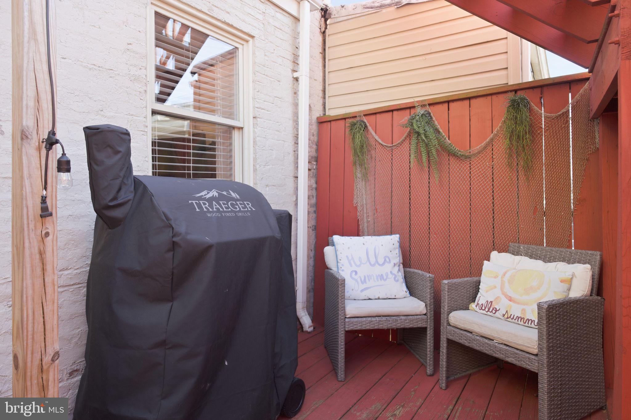 3312 Fleet Street Baltimore, MD 21224 - Photo 25 of 26 a bedroom with furniture and a window