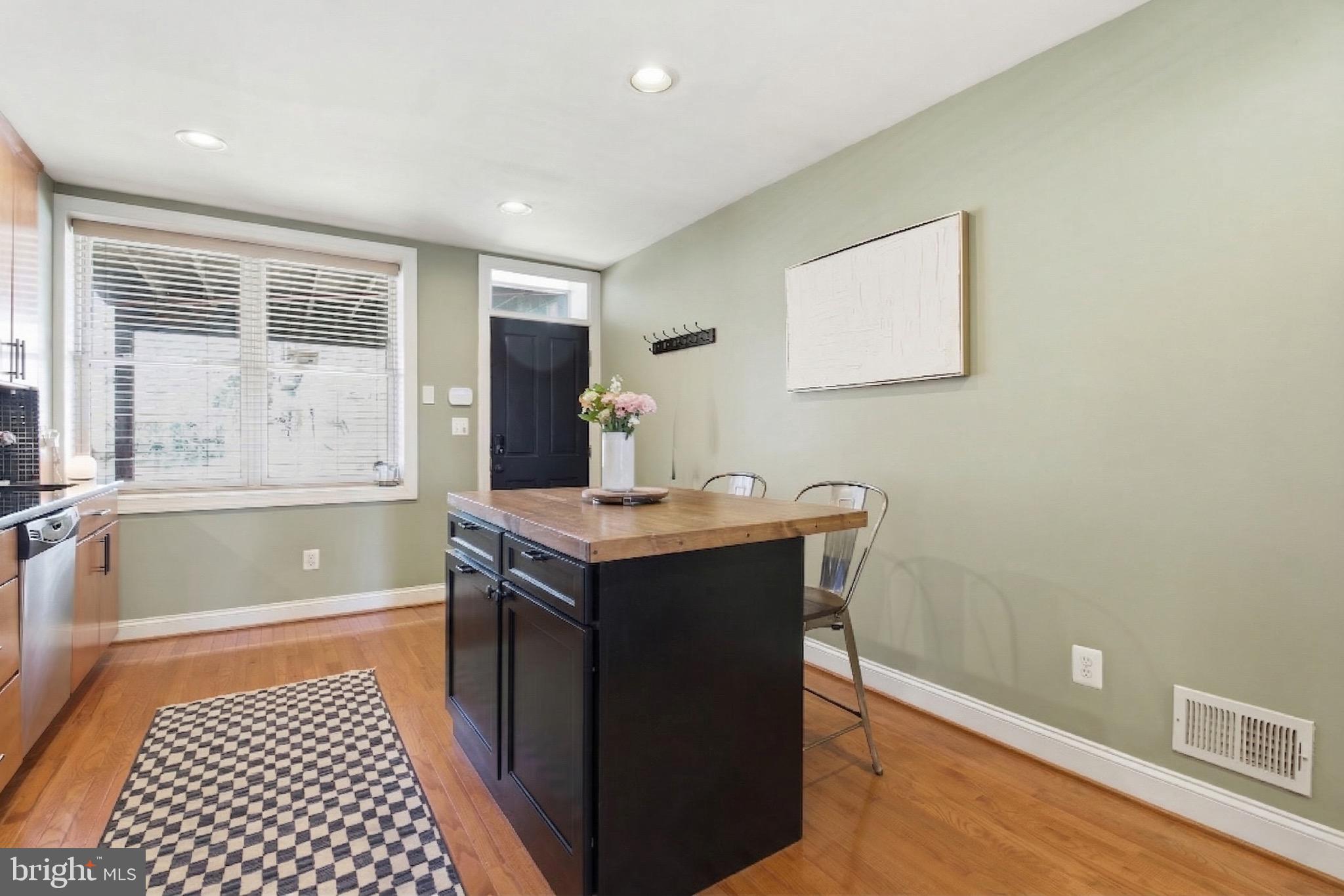 3312 Fleet Street Baltimore, MD 21224 - Photo 8 of 26 a bathroom with a sink and a bathtub