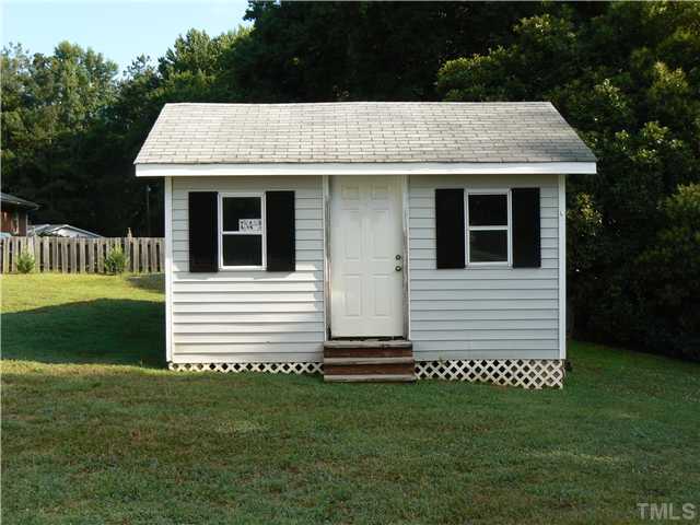 1723 Bahama Road Bahama, NC 27503 - Photo 5 of 14 a view of a house with a garden