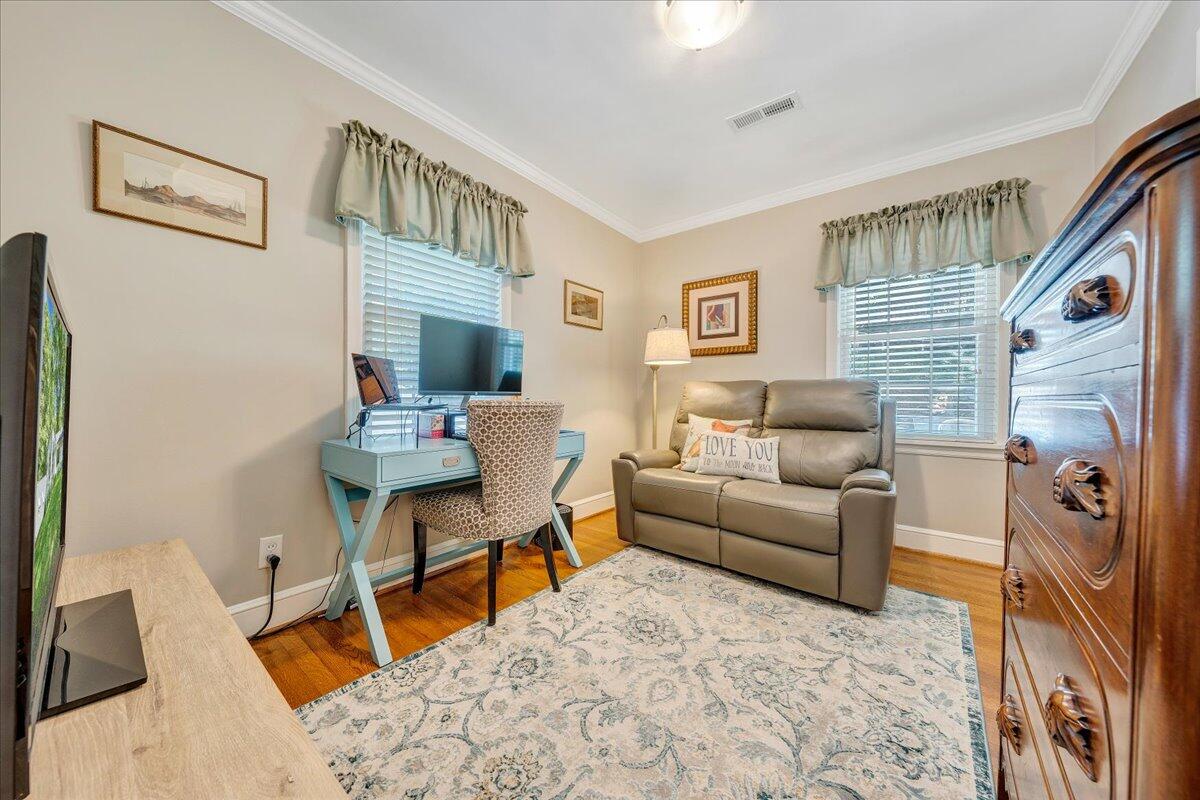 3150 West Ridge Road Southwest Roanoke, VA 24014 - Photo 24 of 50 a living room with furniture and a fireplace
