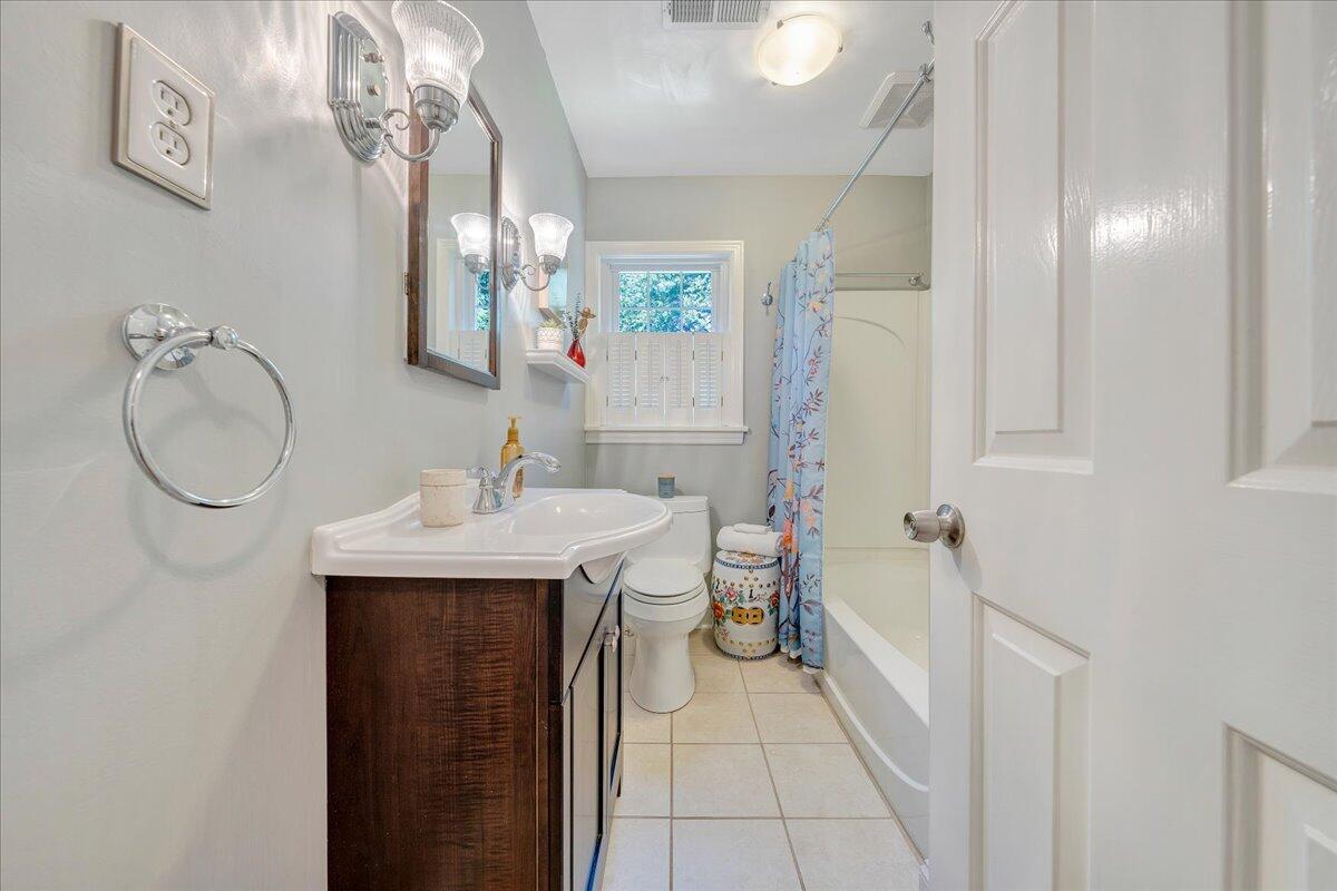 3150 West Ridge Road Southwest Roanoke, VA 24014 - Photo 34 of 50 a spacious bathroom with a sink a mirror and a shower