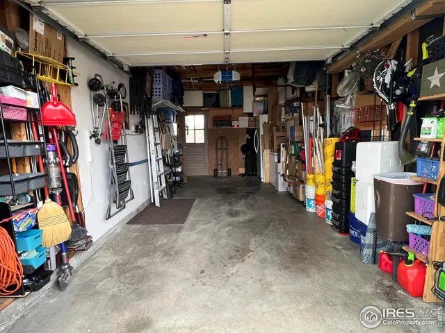 a view of a storage room with clothes