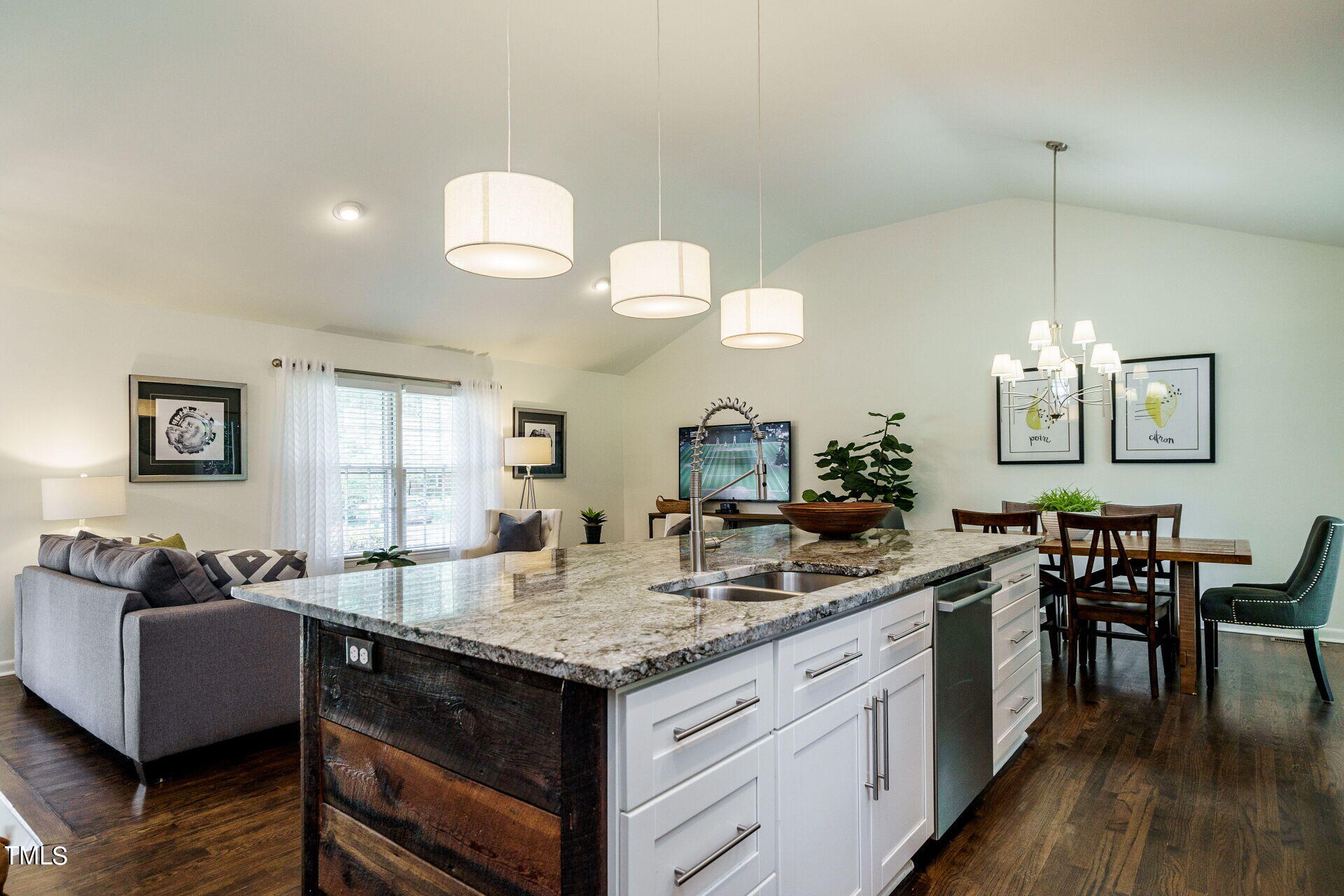 318 Glen Valley Road Raleigh, NC 27609 - Photo 17 of 39 a kitchen with center island table and chairs