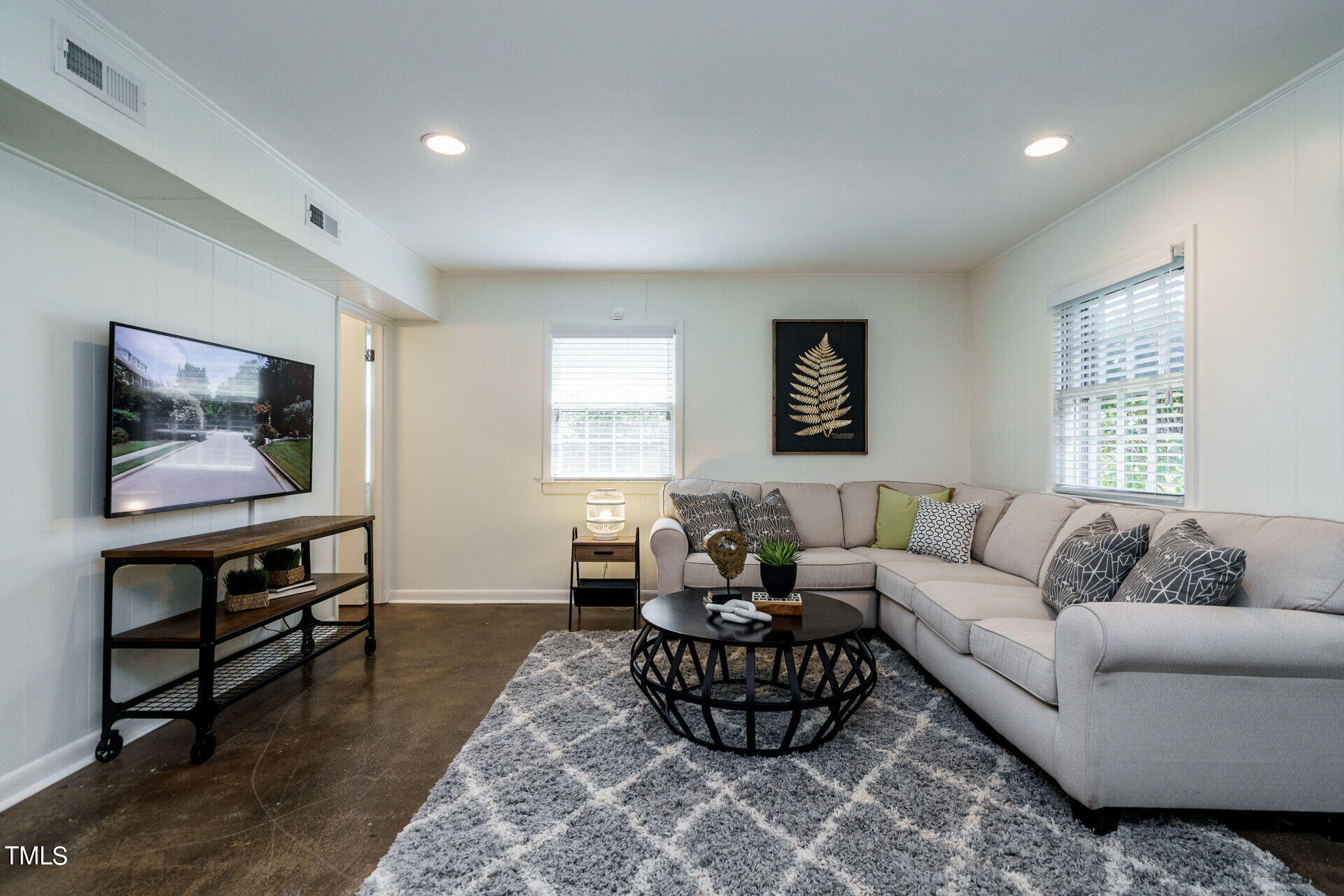 318 Glen Valley Road Raleigh, NC 27609 - Photo 19 of 39 a living room with furniture and a window