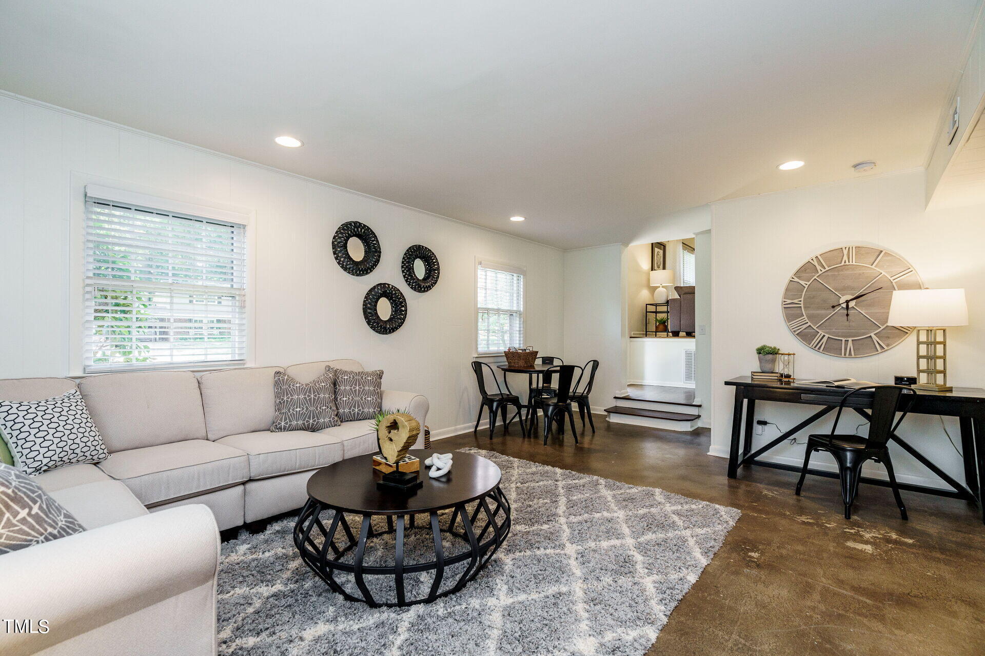 318 Glen Valley Road Raleigh, NC 27609 - Photo 20 of 39 a living room with furniture rug and window