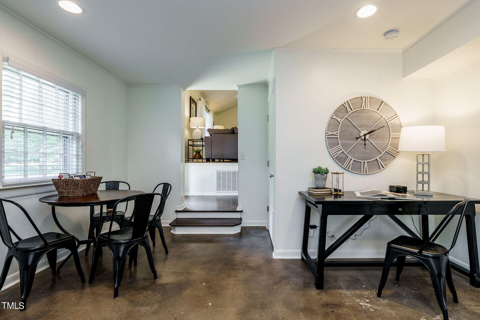 318 Glen Valley Road Raleigh, NC 27609 - Photo 21 of 39 a view of a dining room with furniture and a window