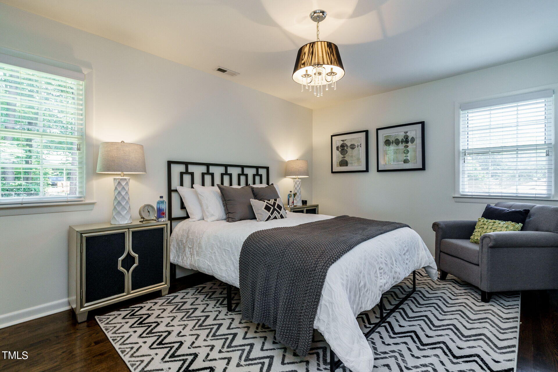 318 Glen Valley Road Raleigh, NC 27609 - Photo 26 of 39 a bed room with a bed and a couch