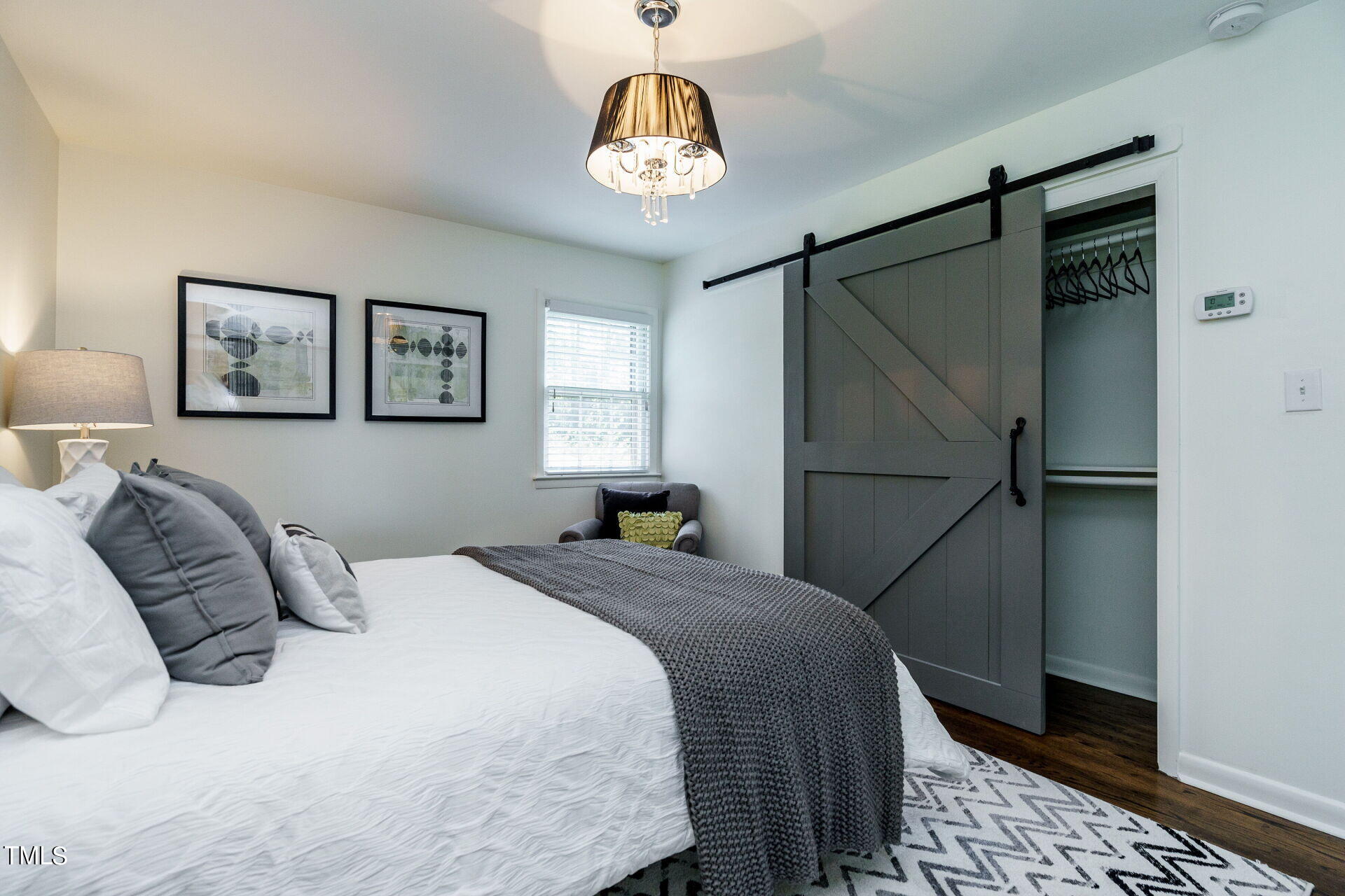 318 Glen Valley Road Raleigh, NC 27609 - Photo 28 of 39 a bedroom with a bed and a window