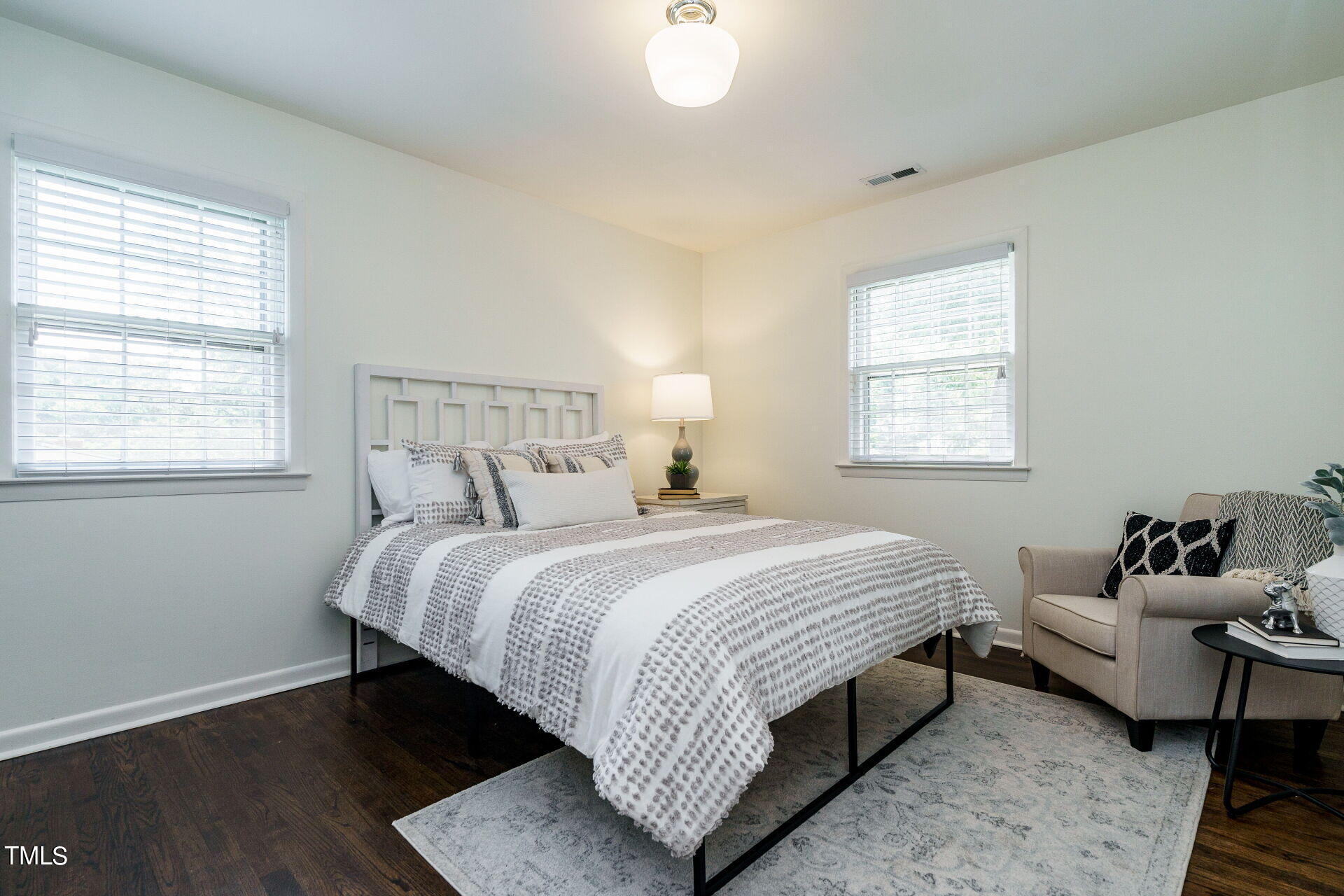 318 Glen Valley Road Raleigh, NC 27609 - Photo 32 of 39 a bedroom with bed and window